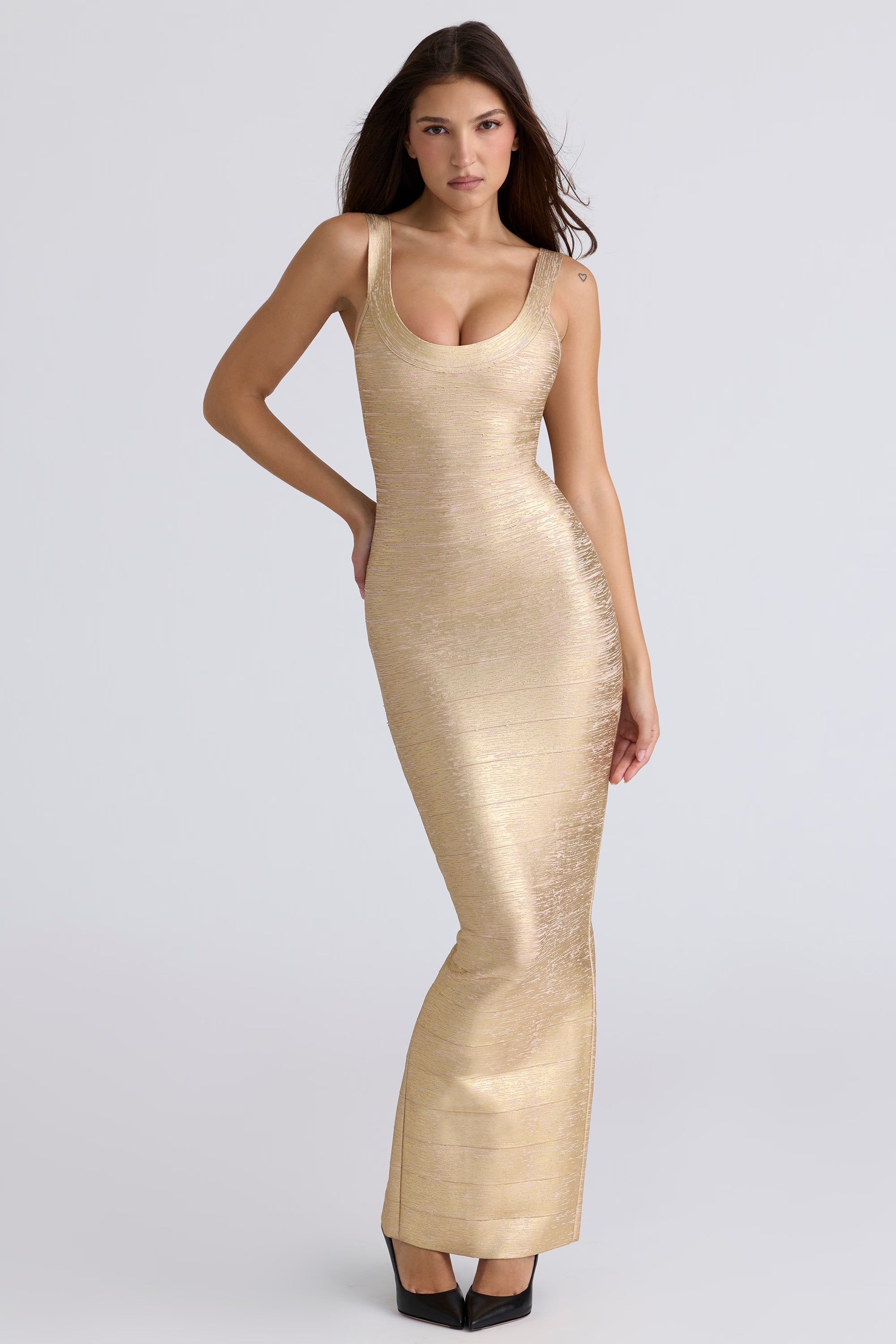 The OG gold bandage maxi dress